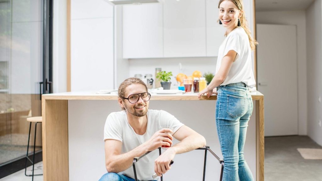 Husband and wife cleaning house