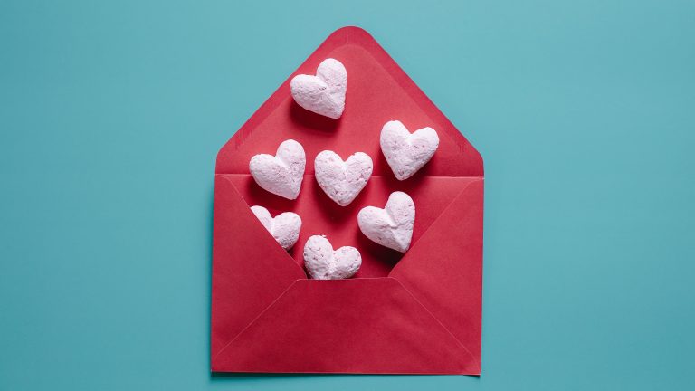 pink hearts go out from the red envelope