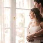 Couple looking through a window: How to get your Partner interested in You Again